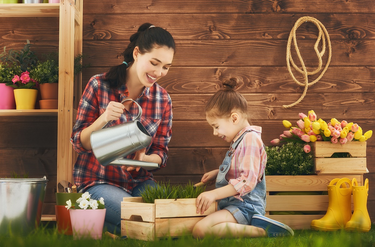 mother and daughter planting