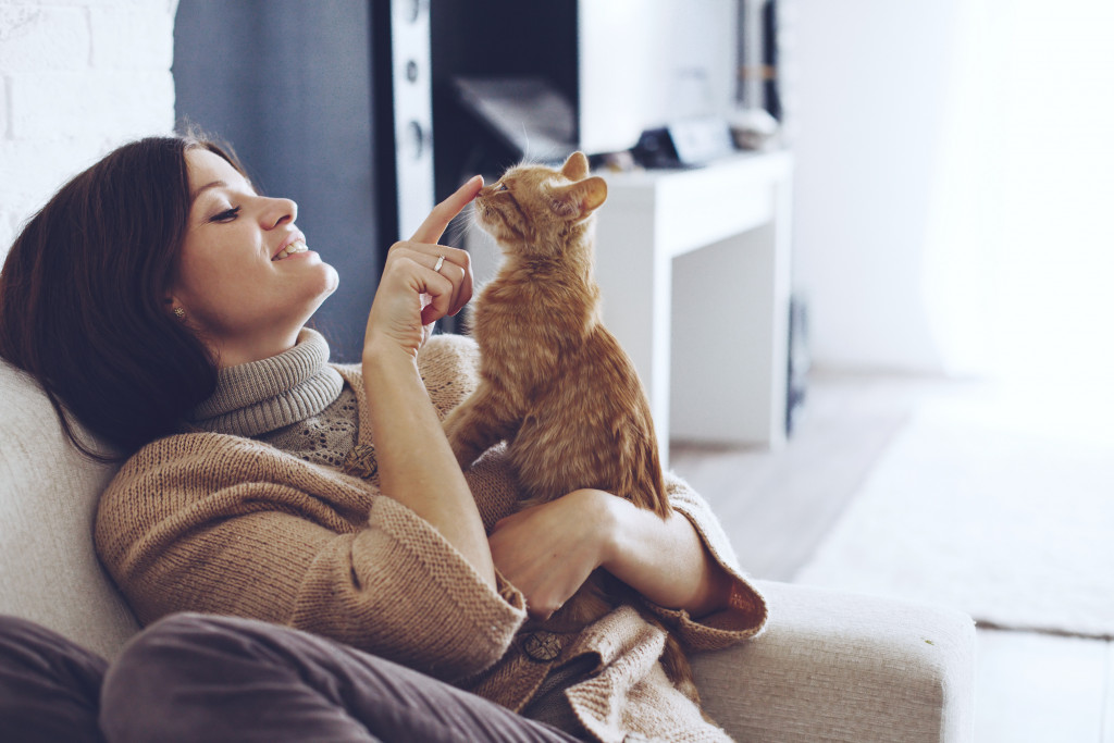 female cat owner sitting