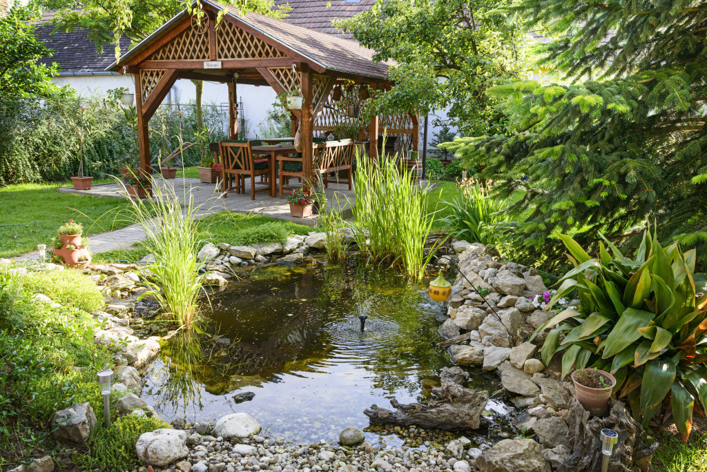 home pond outdoors with seating area